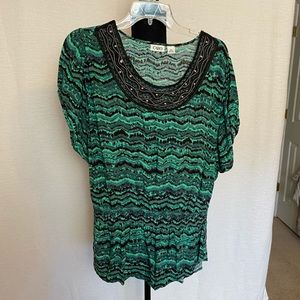 GC green an black top